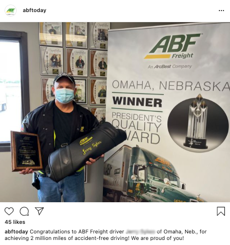 trucker receiving award for miles